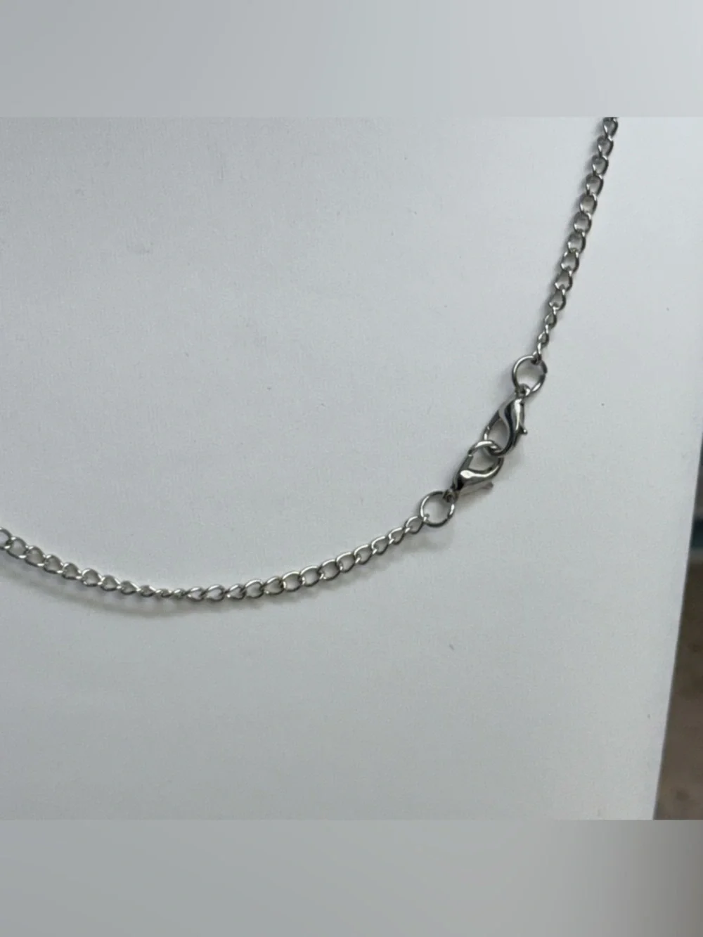 Silver and black y-style tassel necklace